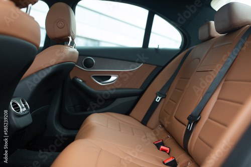 Luxury car rear seats row. Expensive car leather seats. Luxurious Rear Seat Interior of a High-End Automobile. Stylish and Comfortable Rear Seating Area of a Premium Car