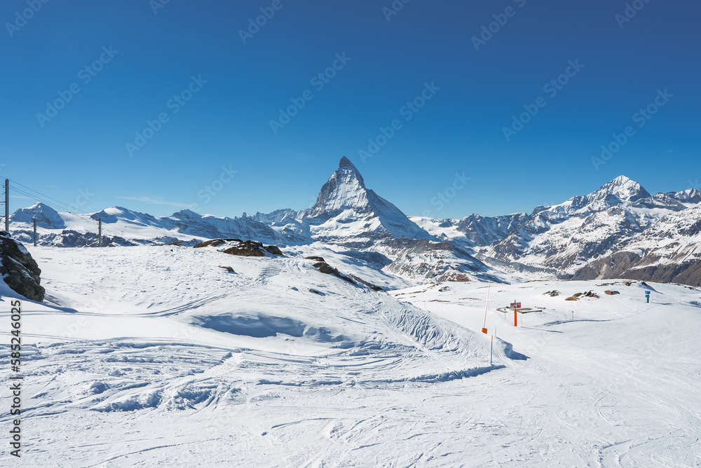 Scenic sunrise or sunset view of Matterhorn - one of the most famous and iconic Swiss mountains, Zermatt, Valais, Switzerland