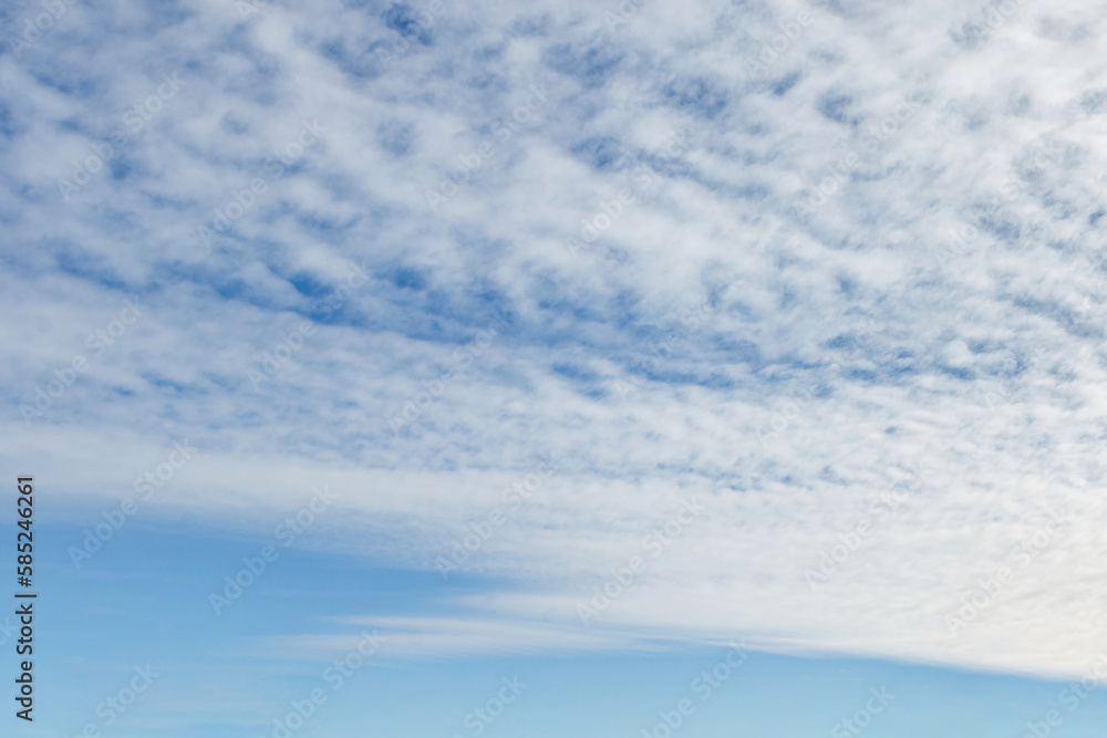 Beautiful blue sky with large white clouds backdrop. April weather spring sky background Beautiful blue sky with large white clouds backdrop. April weather spring sky background
