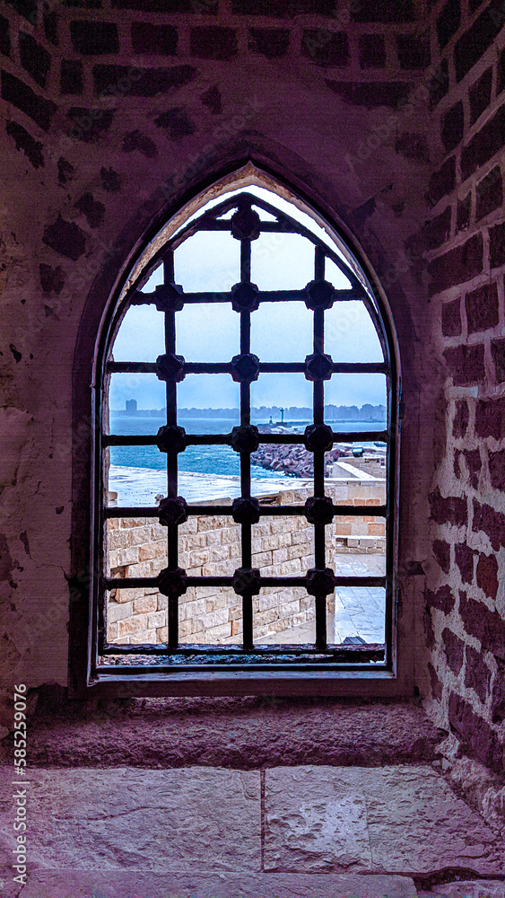 Peeking from the window of qaitbay citadel egypt