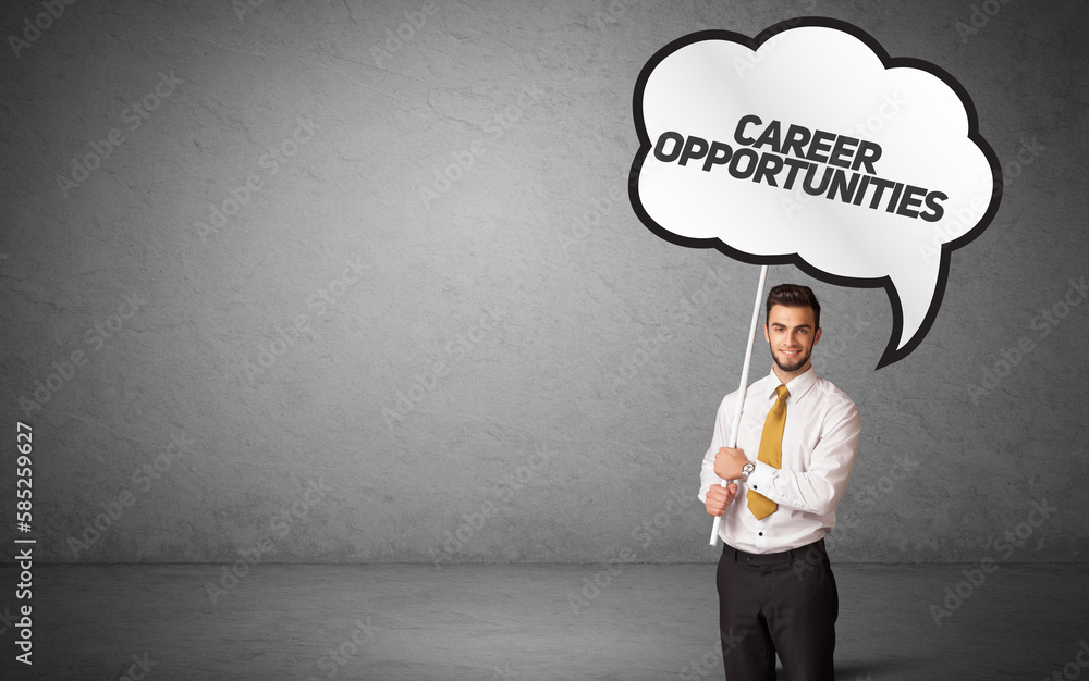 business person in casual holding road sign business person in casual holding road sign