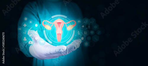 Female reproductive health concept. endometriosis, PCOS, gynecologic cancer, cervical cancer, uterine fibroids, hysterectomy. Modern digital medicine. Doctor isolated on dark background photo