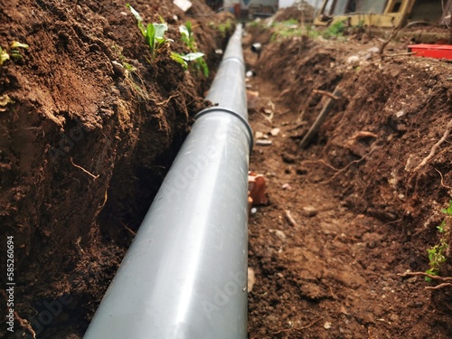 Plastic sawage pipes in the ground for rainwater drainage