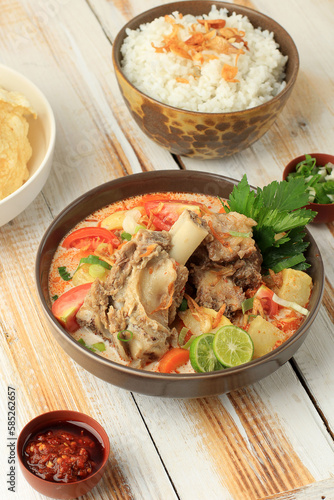 Soto Tangkar, Betawi Cuisine Specialty Soto Made from  Lamb or Beef Ribs Cooked photo