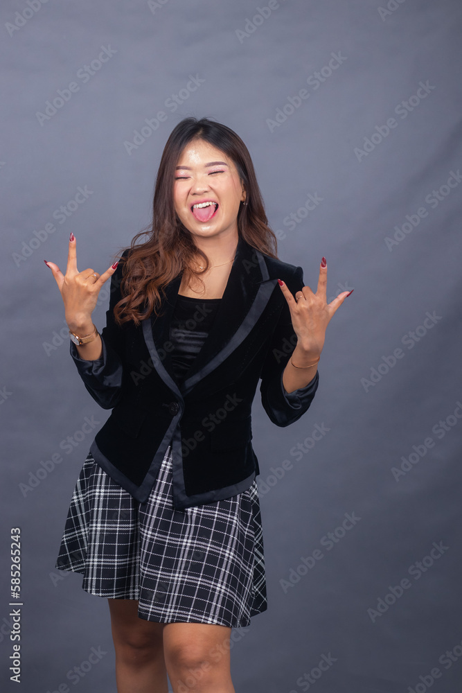 beautiful chinese asian women dressed in formal office wear jackets and skirts. girl expression smiling formal pose all hands showing ferocious metal markings beautiful chinese asian women dressed in formal office wear jackets and skirts. girl expression smiling formal pose all hands showing ferocious metal markings