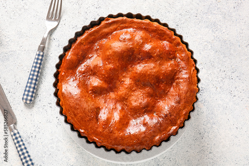 Golden brown baked pie in f...