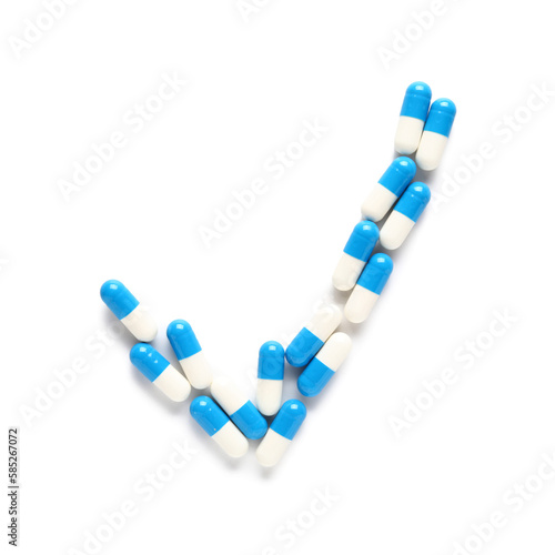 Check mark made of capsules...