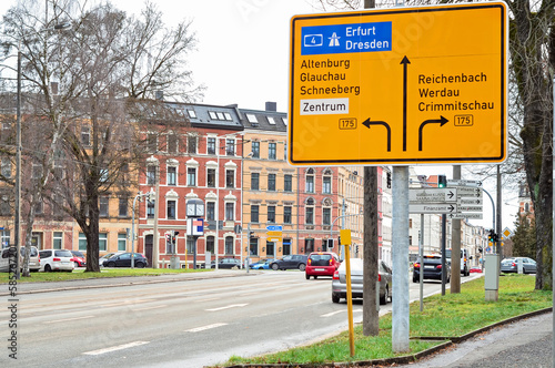 View of city street with direction signs © Pixel-Shot