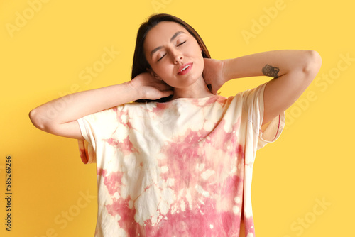 Stylish young woman in tie-...