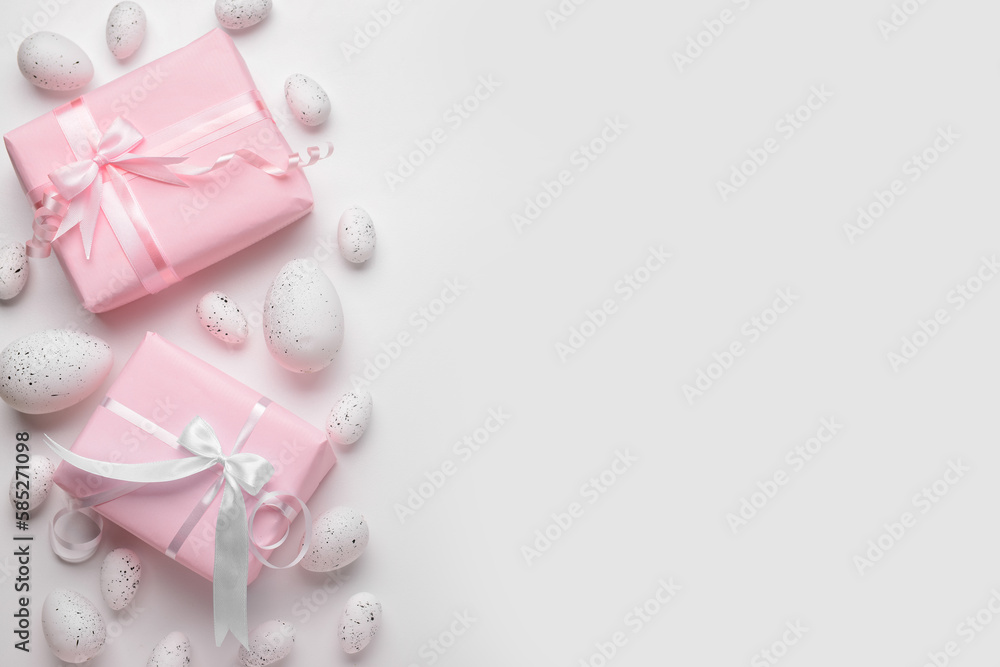 Easter eggs and gift boxes on white background Easter eggs and gift boxes on white background