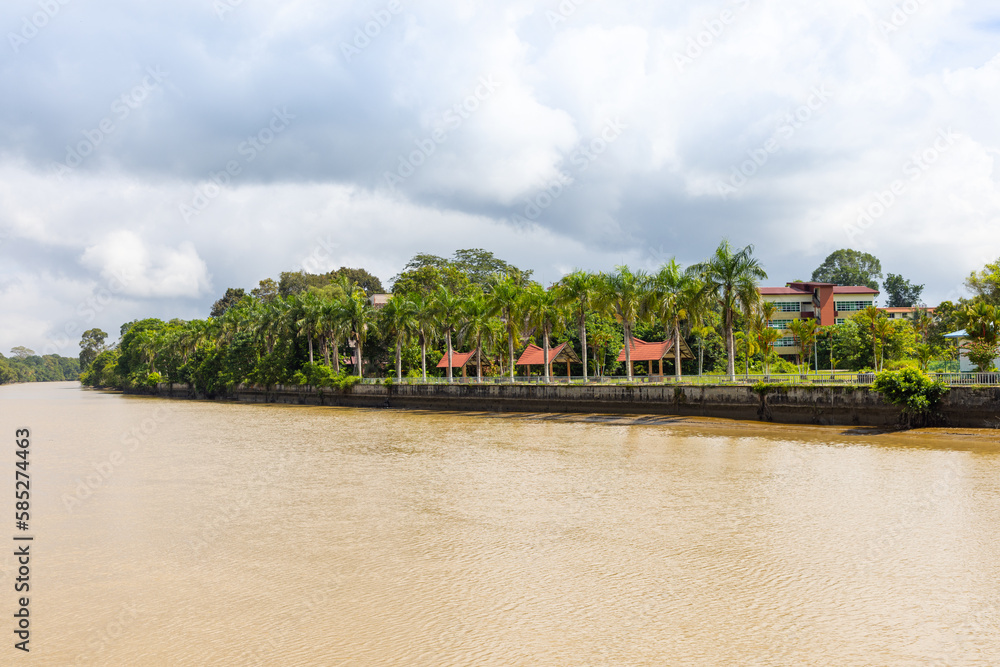 buildings and trees along Sungai Temburong river in the Temburong District in Brunei Darussalam
