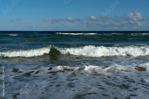 View of the incoming wave on the Baltic Sea on the shore of the Curonian Spit on a summer day  Kaliningrad region  Russia