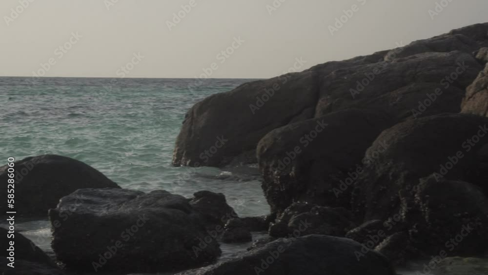 sunlight and rock stone at tropical seashore beach sea. Vacation travel holiday sunlight and rock stone at tropical seashore beach sea. Vacation travel holiday
