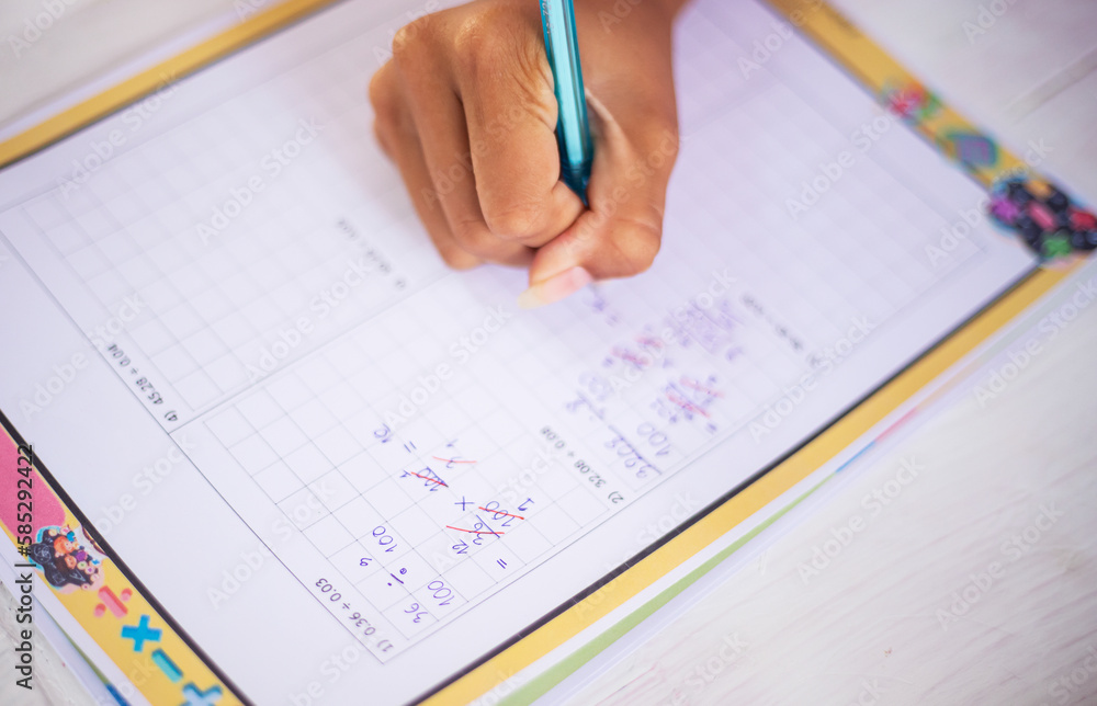 little boy doing math homework in school with sheet for learning activity idea. selective focus. little boy doing math homework in school with sheet for learning activity idea. selective focus.