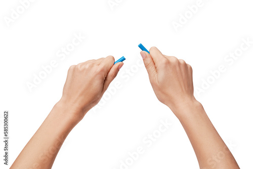 hands breaking a blue bar