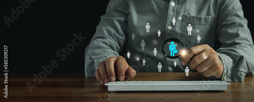Man using magnifying glass to look person,HR (Human Resources) job recruitment Concept, choose the right people.Employees leadership quality of world technology, Business management in organization.