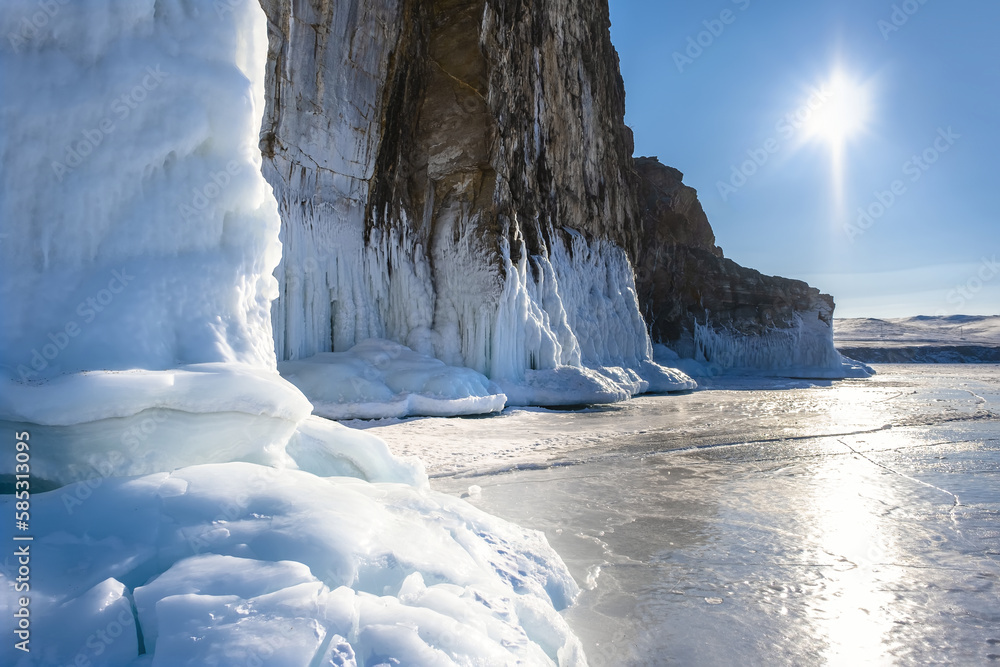 Ice splashes and icicles Olkhon on lake Baikal island in February, Russia