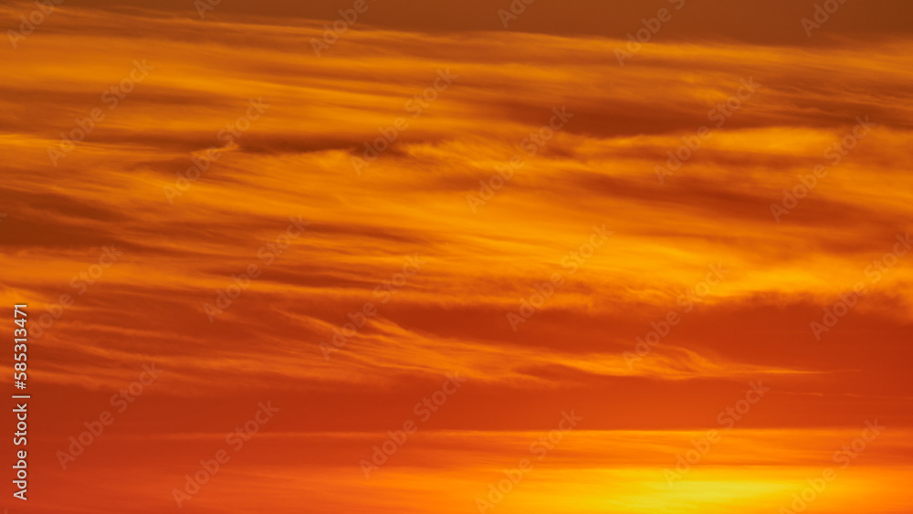 Evening red clouds at sunset, sky background
