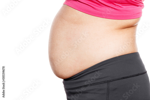 Woman with excessive belly fat against isolated on white background