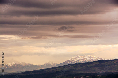 Panoramic view of dramatic, cloudy skies over the swiss central Alps - with mountains, Pilatus, Switzerland