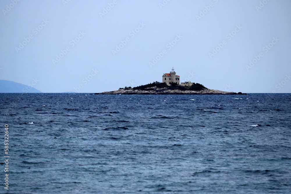 island with lighthouse, Orebic, peninsula Peljesac, Croatia