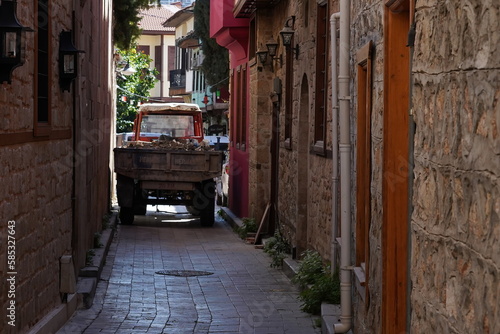 Old truck in a narrow alley