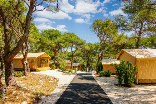 Luxurious glamping with teepee camping tents in a wooded area. Croatia, Europe. photo