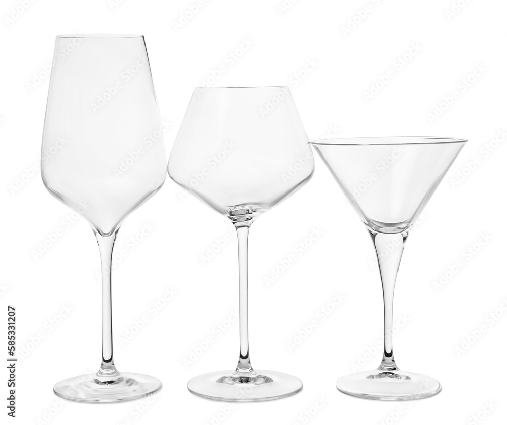 Elegant empty wine and martini glasses isolated on white