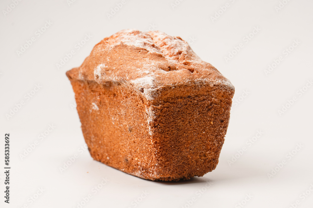 A cupcake with raisins isoalted on a white background. A cupcake with raisins isoalted on a white background.