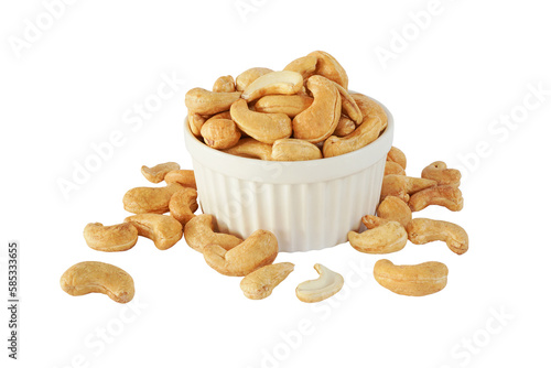 Roasted cashew nut in a white ceramic bowl ,isolated in png format