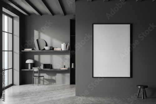 Grey business room interior with desk and laptop, shelf and window. Mockup frame photo