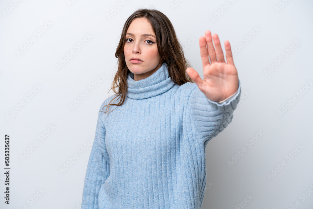 Young caucasian woman isolated on white background making stop gesture Young caucasian woman isolated on white background making stop gesture
