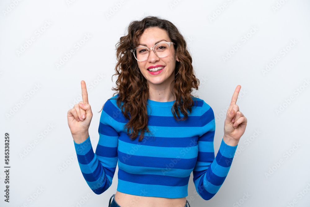 Fototapeta premium Young caucasian woman isolated on white background pointing up a great idea