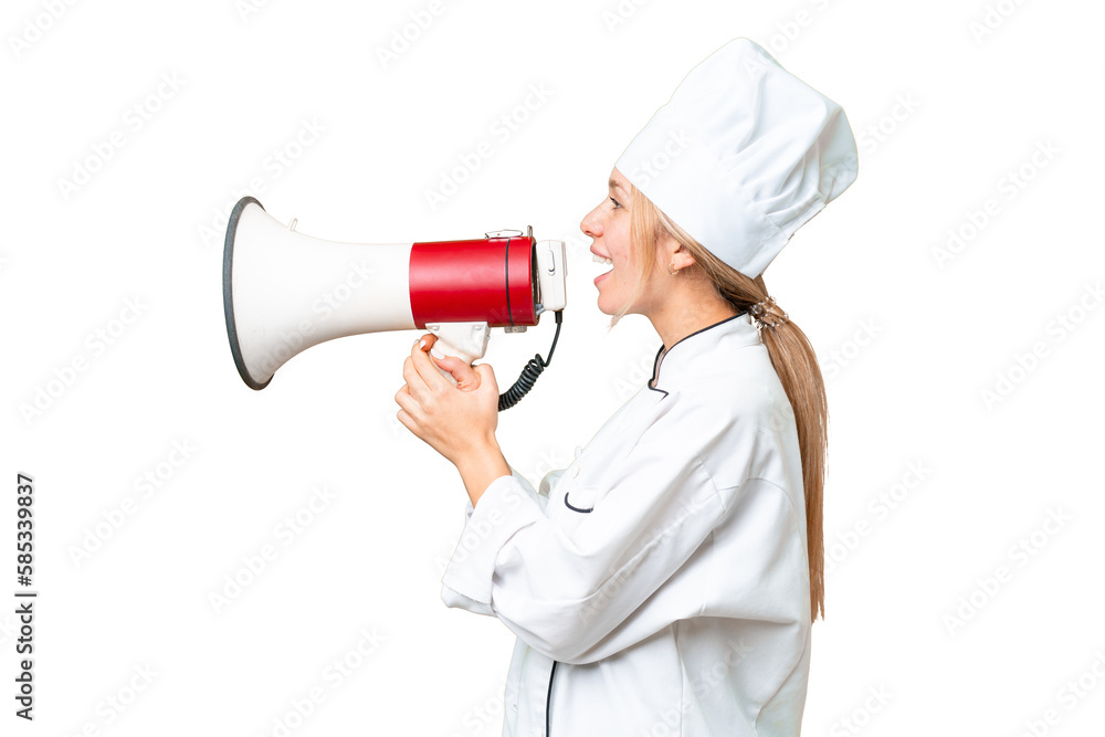 Young chef woman over isolated chroma key background shouting through a megaphone Young chef woman over isolated chroma key background shouting through a megaphone