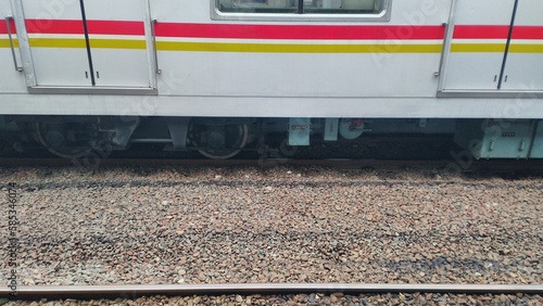 photo of the bottom of an electric train car like a train wheel. The photo was taken at Depok Station, West Java, Indonesia. November 4, 2022