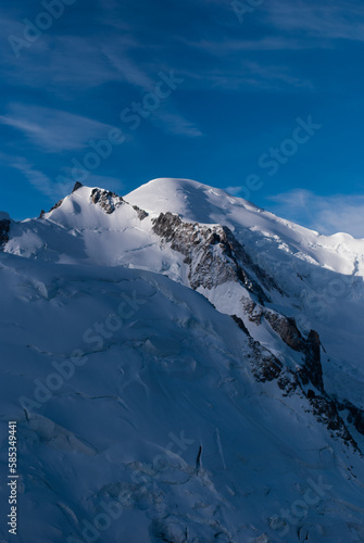 Sunlight on snowy mountain in Alps © Veronica Holubnycha