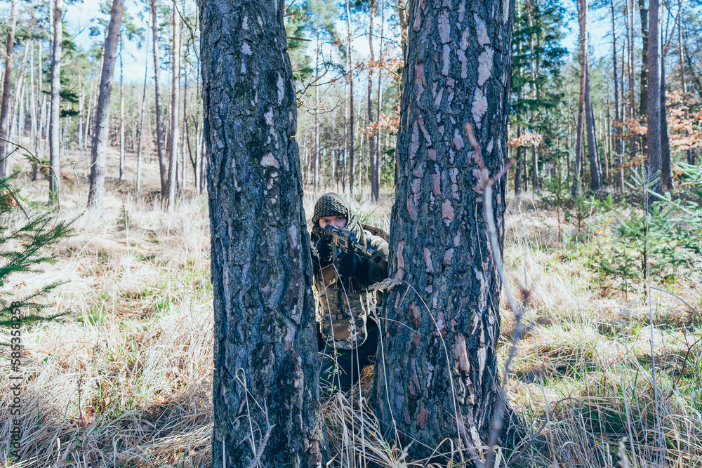 Soldier in a trench. Member of the International Legion patrols. The war in Ukraine.Army soldier Patrolled the front line Soldier in a trench. Member of the International Legion patrols. The war in Ukraine.Army soldier Patrolled the front line
