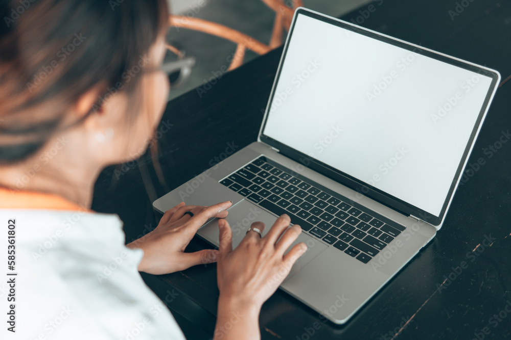 woman using laptop computer. Blank screen laptop mock up. woman using laptop computer. Blank screen laptop mock up.