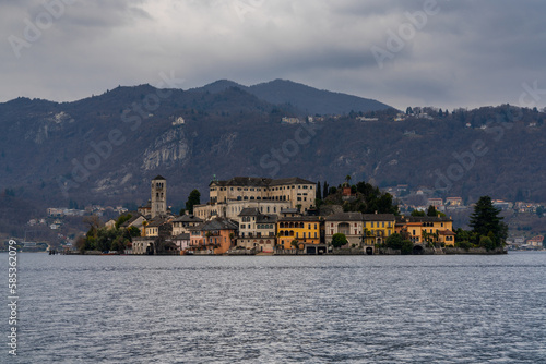 view of Lake Orta and the Isola San Guilio islet with its historic buildings