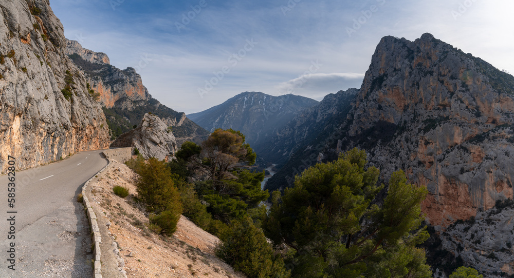 narrow mountain road leads into the wild and rugged landscape of the Verdon Gorge in southeastern France