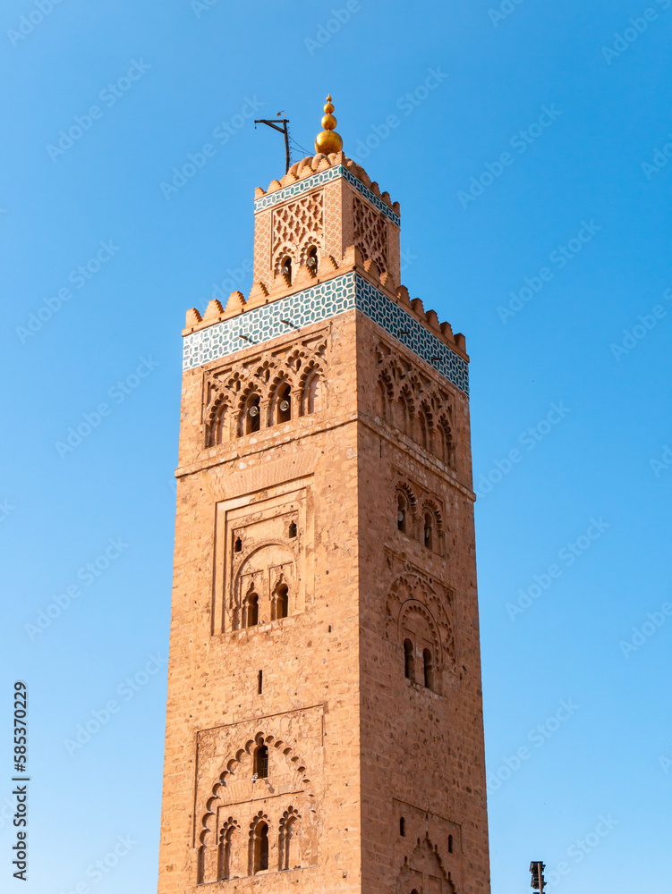 Fototapeta premium Koutoubia - Kutubiyya Mosque in Marrakesh on a sunny winter morning - Close-up Minaret shot