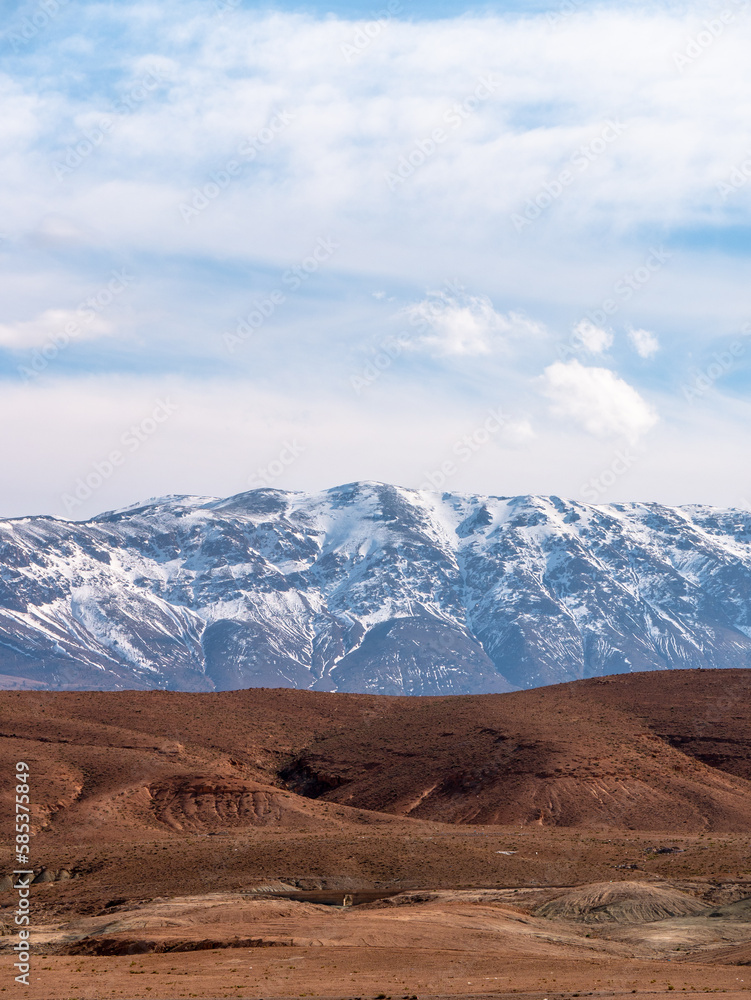 Fototapeta premium Stunning mountain scenery in the High Atlas Moutains near Midelt, Morocco during the winter - Portrait shot