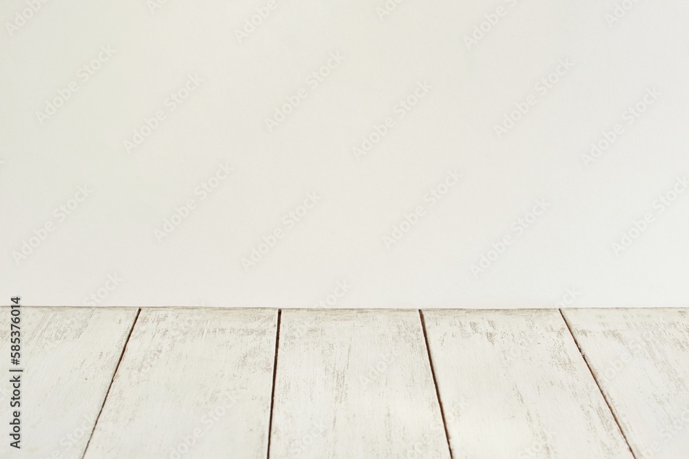 Background of aged white painted wooden planks and pure white blank background close-up. Background of aged white painted wooden planks and pure white blank background close-up.