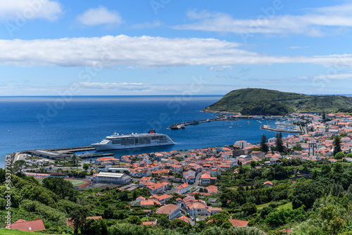 View over Horta, there is a cruise ship in the harbour / View over the city of Horta, a cruise ship is in the port, Azores, Portugal.