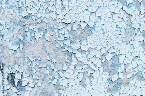 Blue texture of old cracked paint, grunge background.