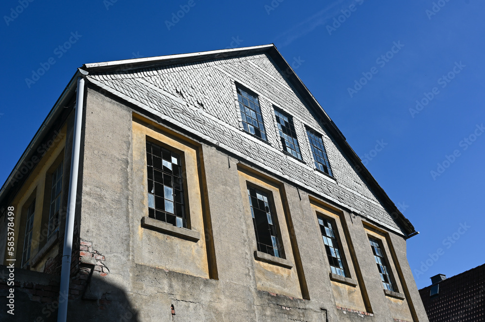 Old facade with broken windows
