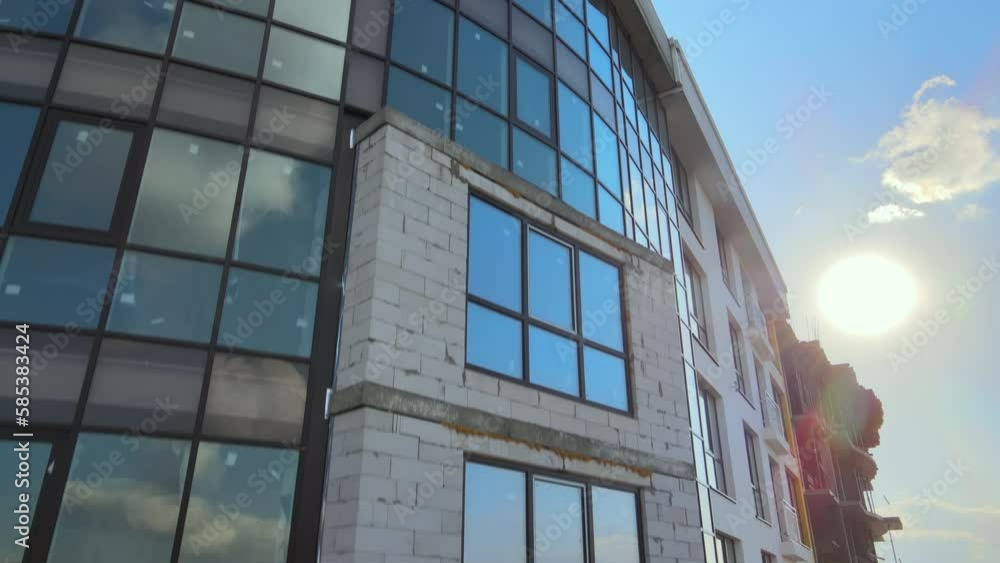 custom made wallpaper toronto digitalHigh residential apartment building with monolithic frame and glass windows under construction. Real estate development