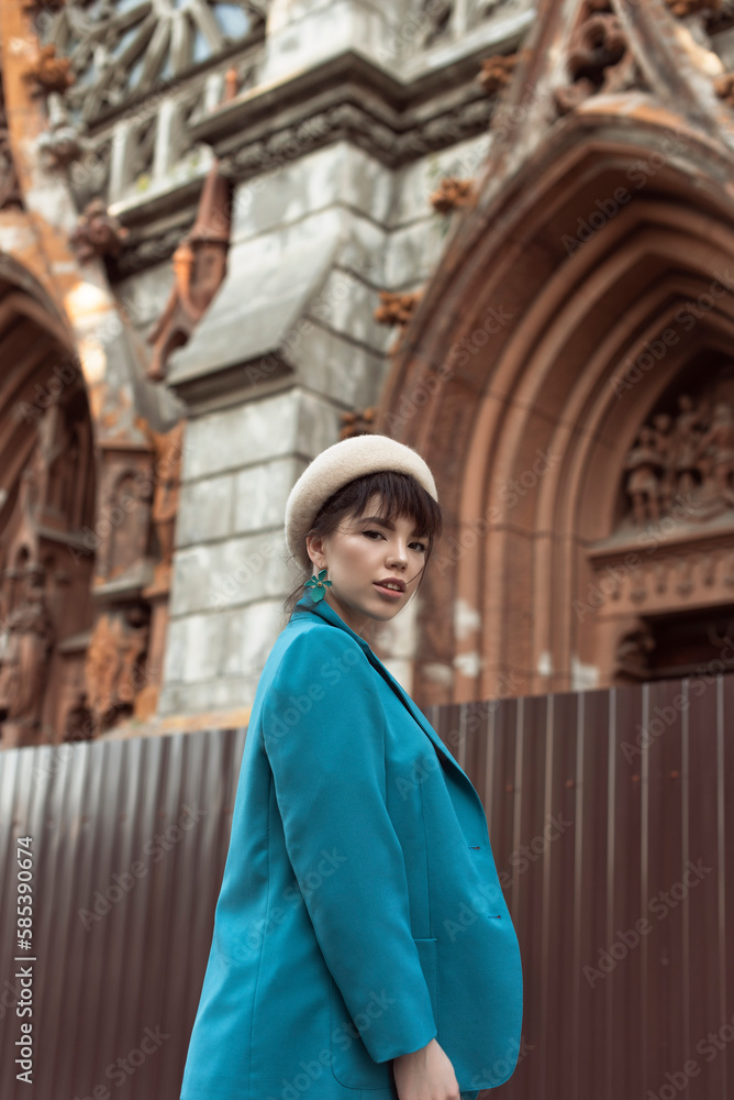 Brunette in a beret in the autumn city Brunette in a beret in the autumn city