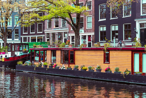 Dutch houses and canals on the street of Amsterdam
