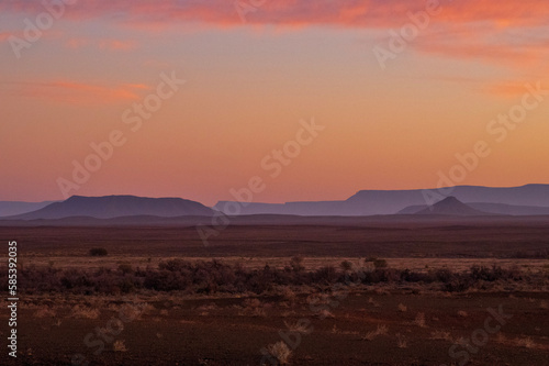 Toward the Roggeveld mountain range. A sunset over the desert of the Tankwa-Karoo National Park. Tankwa means turbid water or thirst land and the park is situated in the succulent Karoo biome.